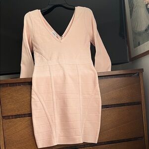 Brand new, beautiful Bebe Blush Long Sleeve Dress. Color pink.